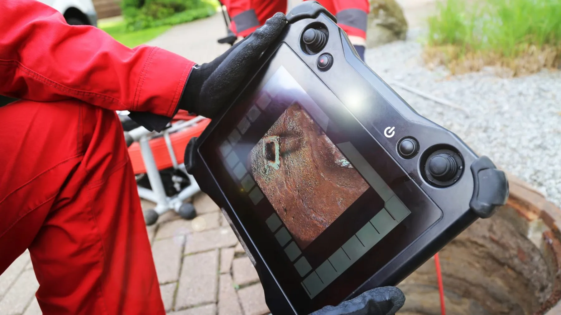 Pipe camera inspecting sewer line, during a Rockwall service call