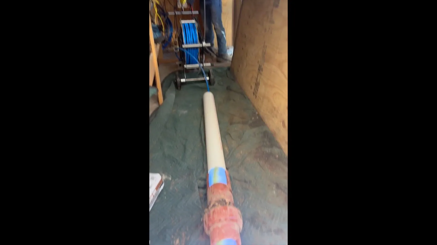 Sewer pipe liner inside small excavation, near Rockwall, Texas